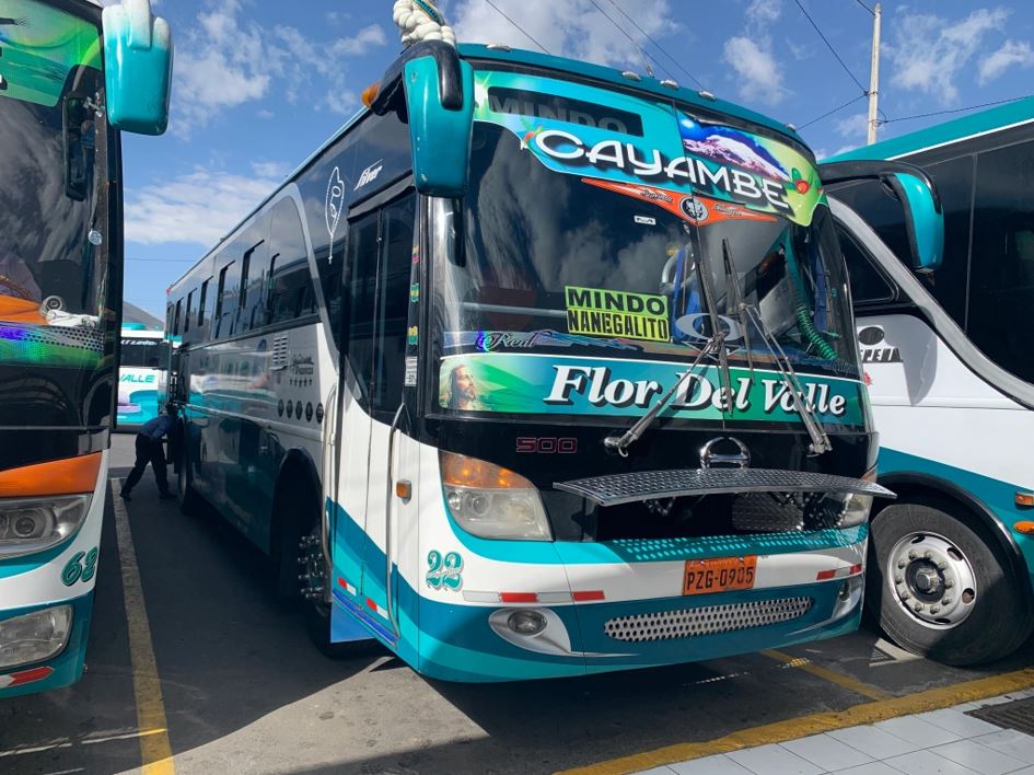 como llegar a mindo, cooperativa de bus